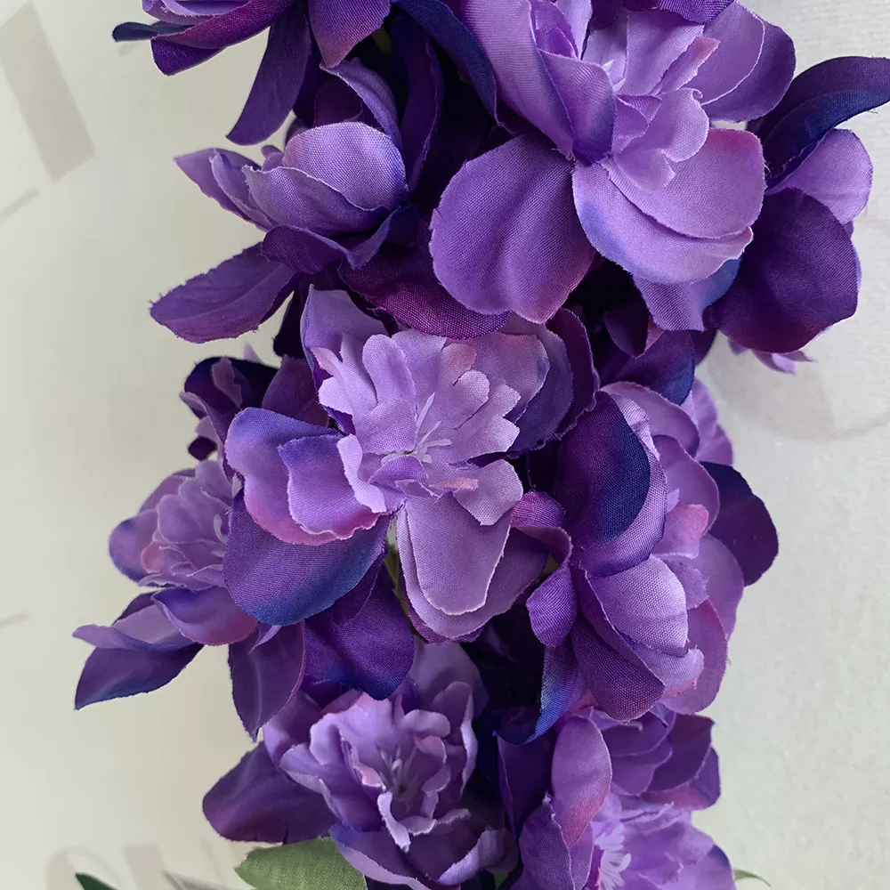 Tall faux delphinium flowers with realistic layered silk petals